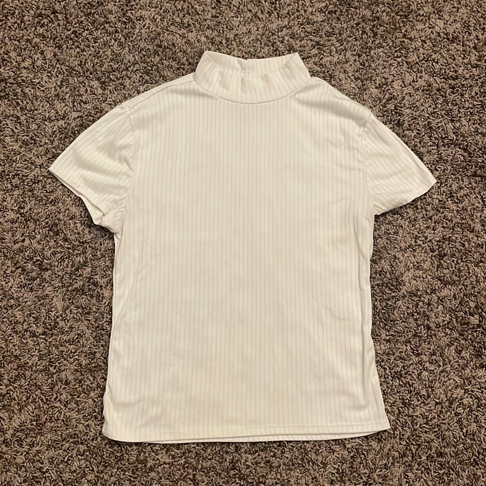 Large white cap sleeved shirt